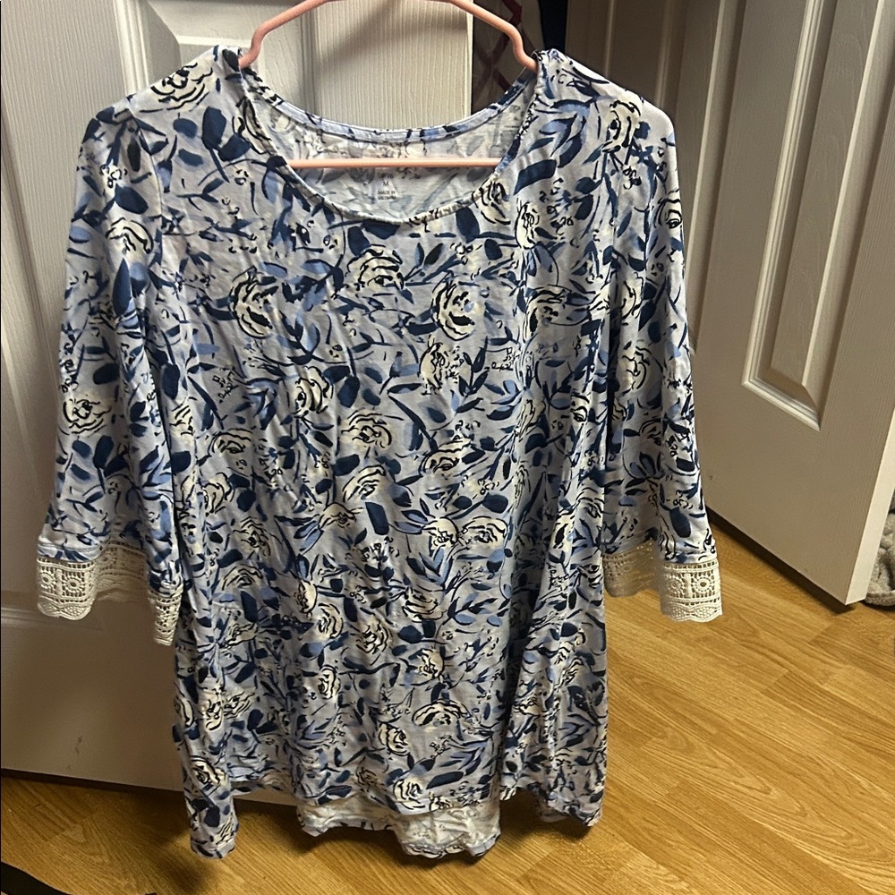 Woman Within Blue and White Floral Blouse